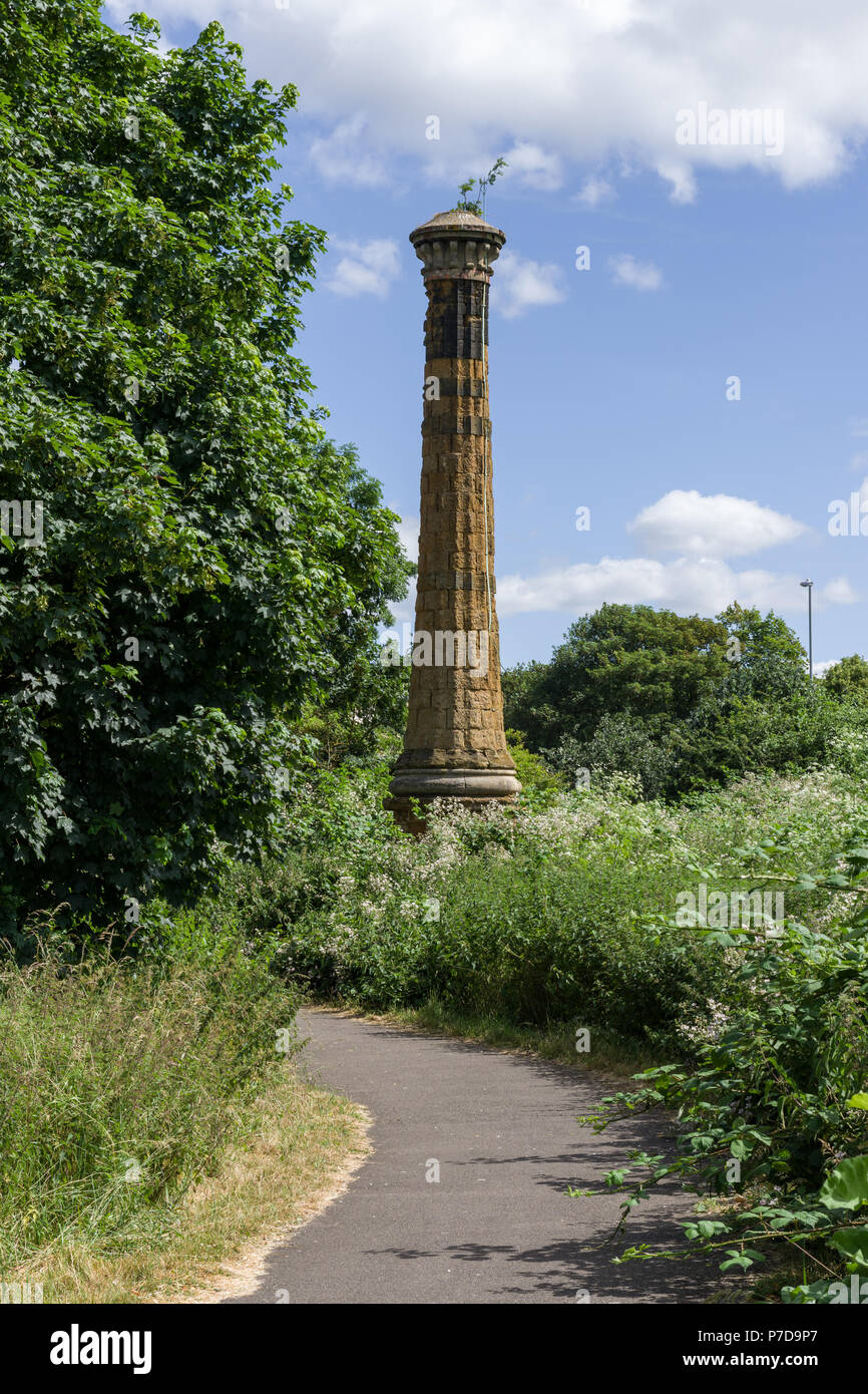 A tall Victorian chimney, all that remains of the town's laundry, Midsummer Meadow, Northampton, UK Stock Photo
