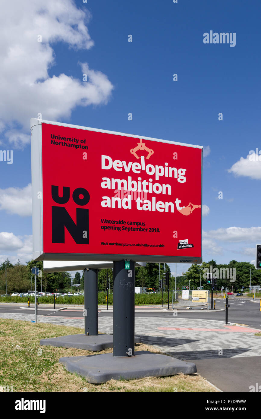 Red roadside sign advertising the new University of Northampton, Waterside Campus, site due to open in September 2018; Northampton, UK Stock Photo