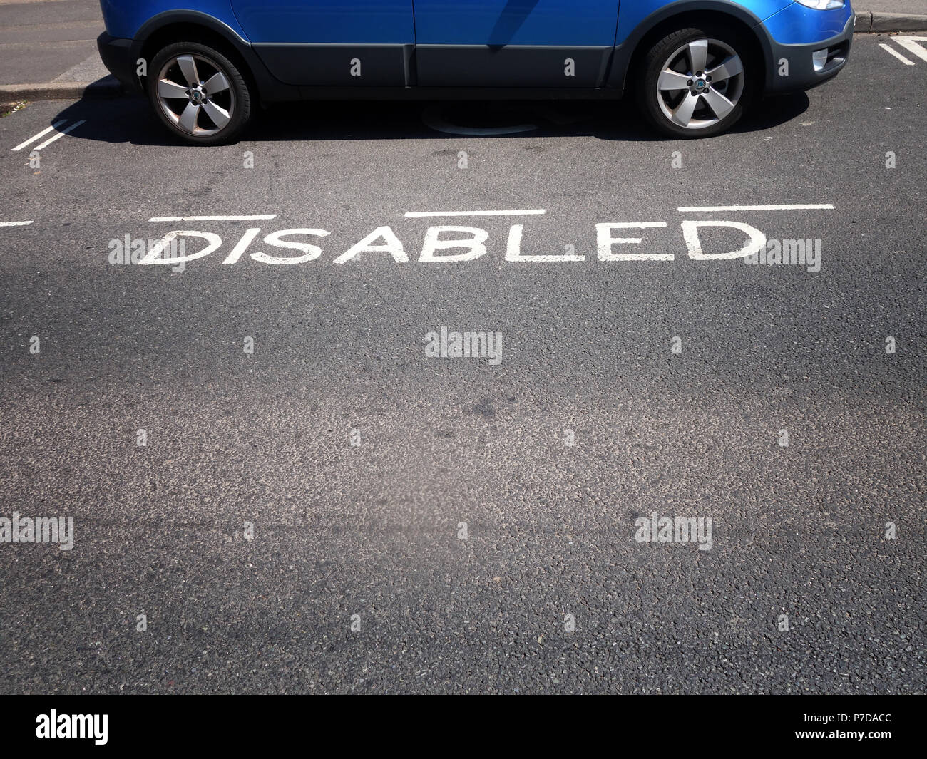 Parked Blue car legally parked showing marked disabled place the tiny ...