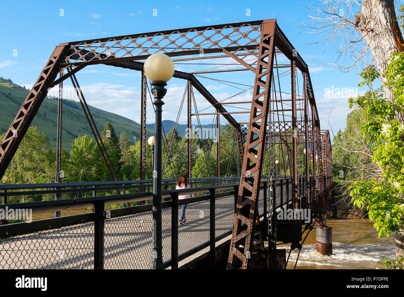 The landmark Van Buren Footbridge over the Clark Fork River to the campus of the University of Montana in Missoula, Montana. Stock Photo