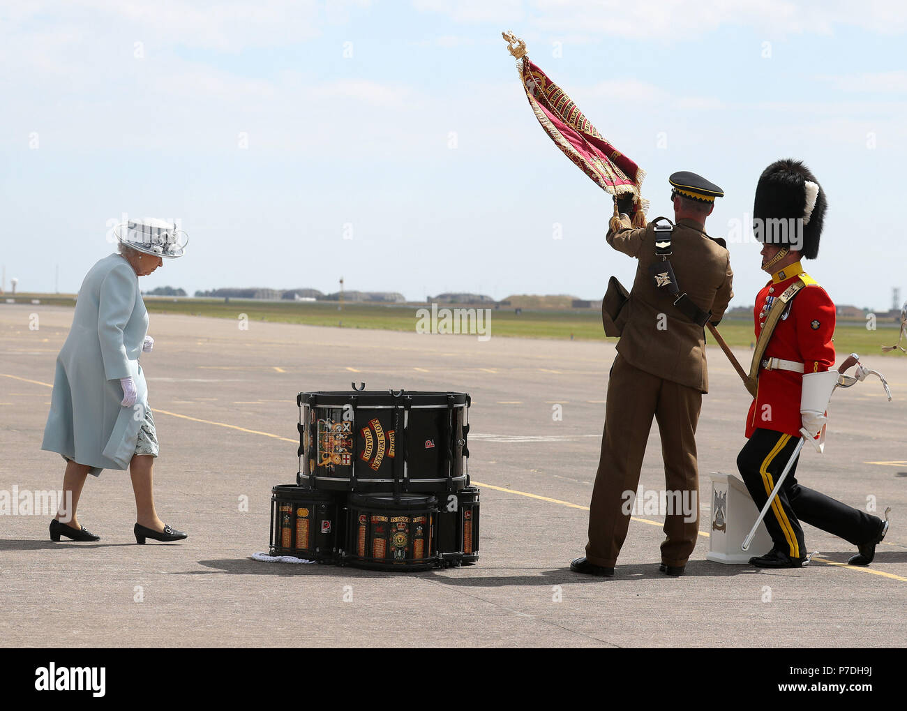Queen Elizabeth II , Colonel-in-Chief Royal Scots Dragoon Guards (Carabiniers and Greys) prepares to touch the New Standard during a ceremony at Leuchars Station in Fife. Stock Photo