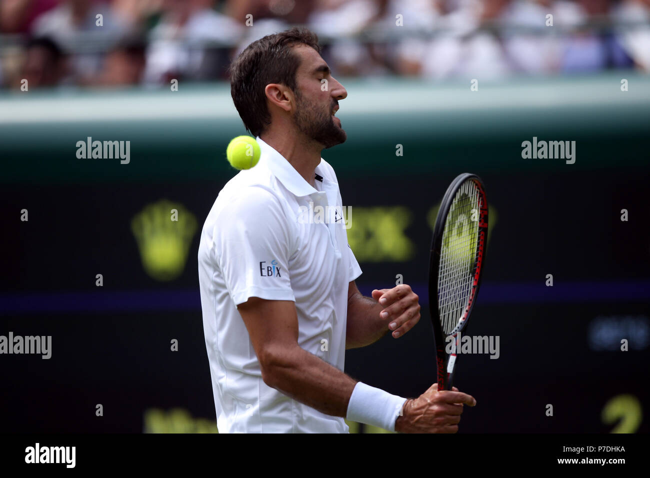 Marin Cilic reacts on day four of the Wimbledon Championships at the All England Lawn Tennis and Croquet Club, Wimbledon. Stock Photo