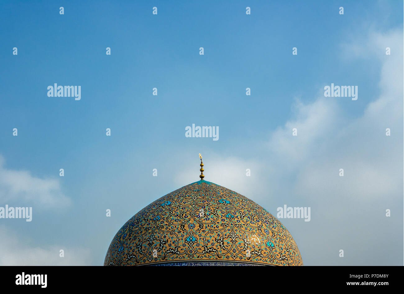 The impressive and colourful dome of the Sheikh Lotfollah Mosque in Naqsh-e-Jahan Square, Isfahan, Iran. Stock Photo