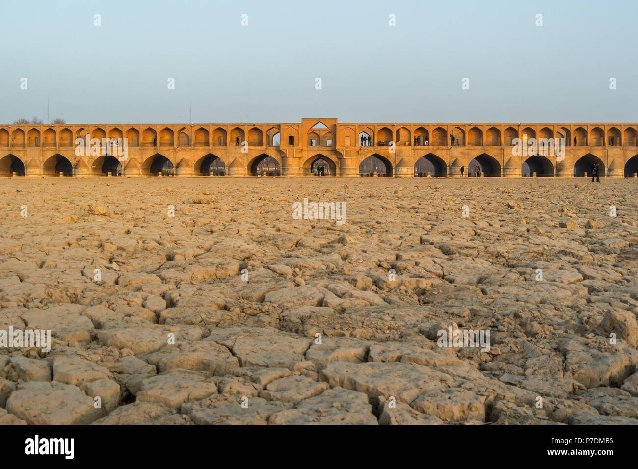 The stunning Khajou Khaju Bridge in Isfahan, Iran crossing the dried river bed of the Zayandeh River. Stock Photo