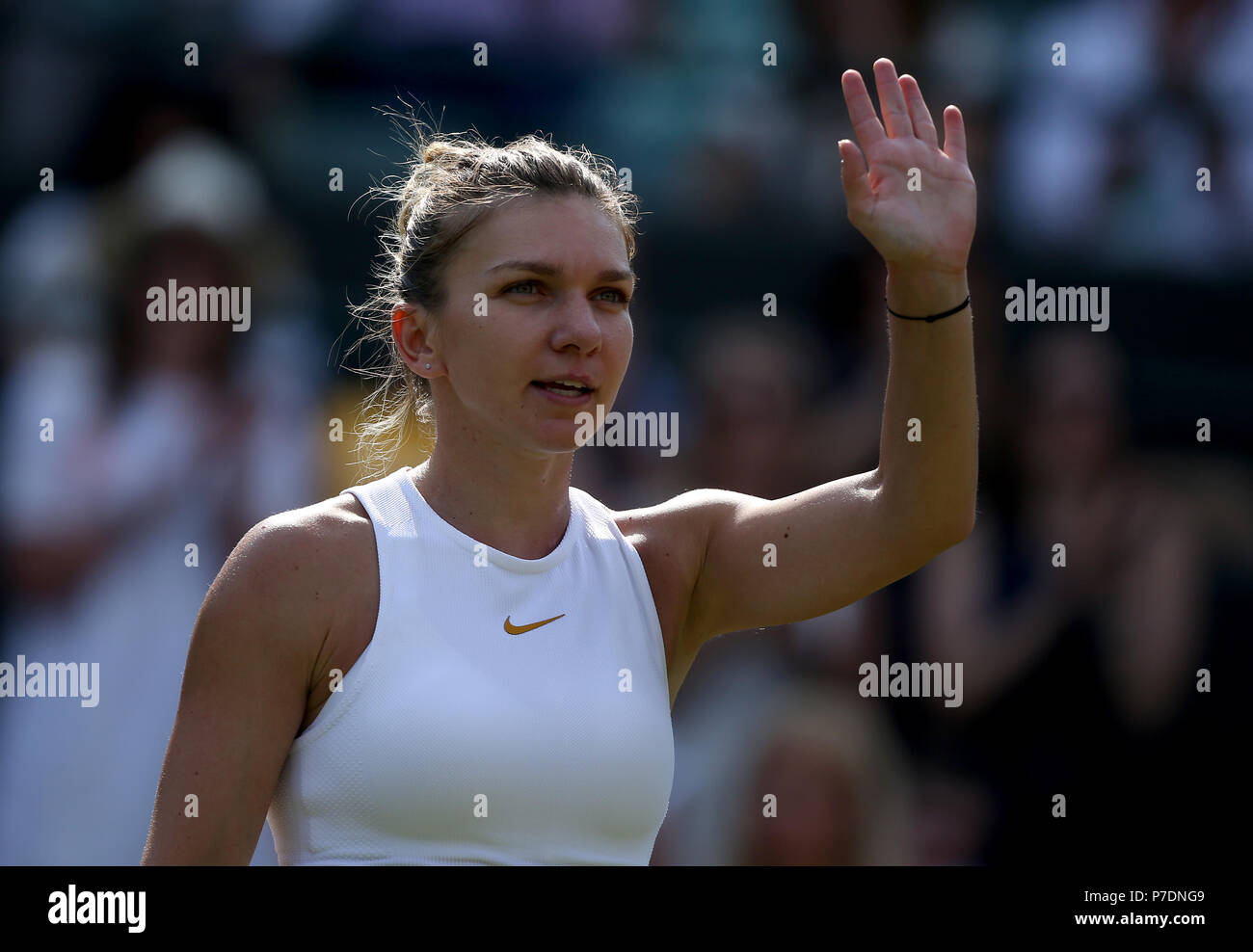 Simona Halep on day four of the Wimbledon Championships at the All England Lawn Tennis and Croquet Club, Wimbledon. Stock Photo