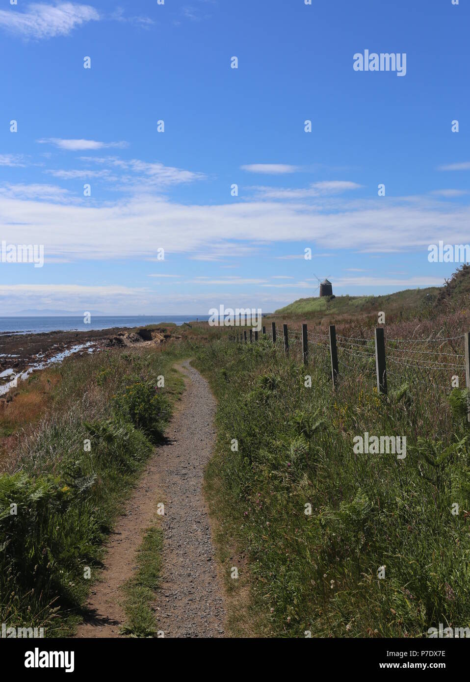 Fife Coastal Path and St Monans windmill Fife Scotland July 2018 Stock