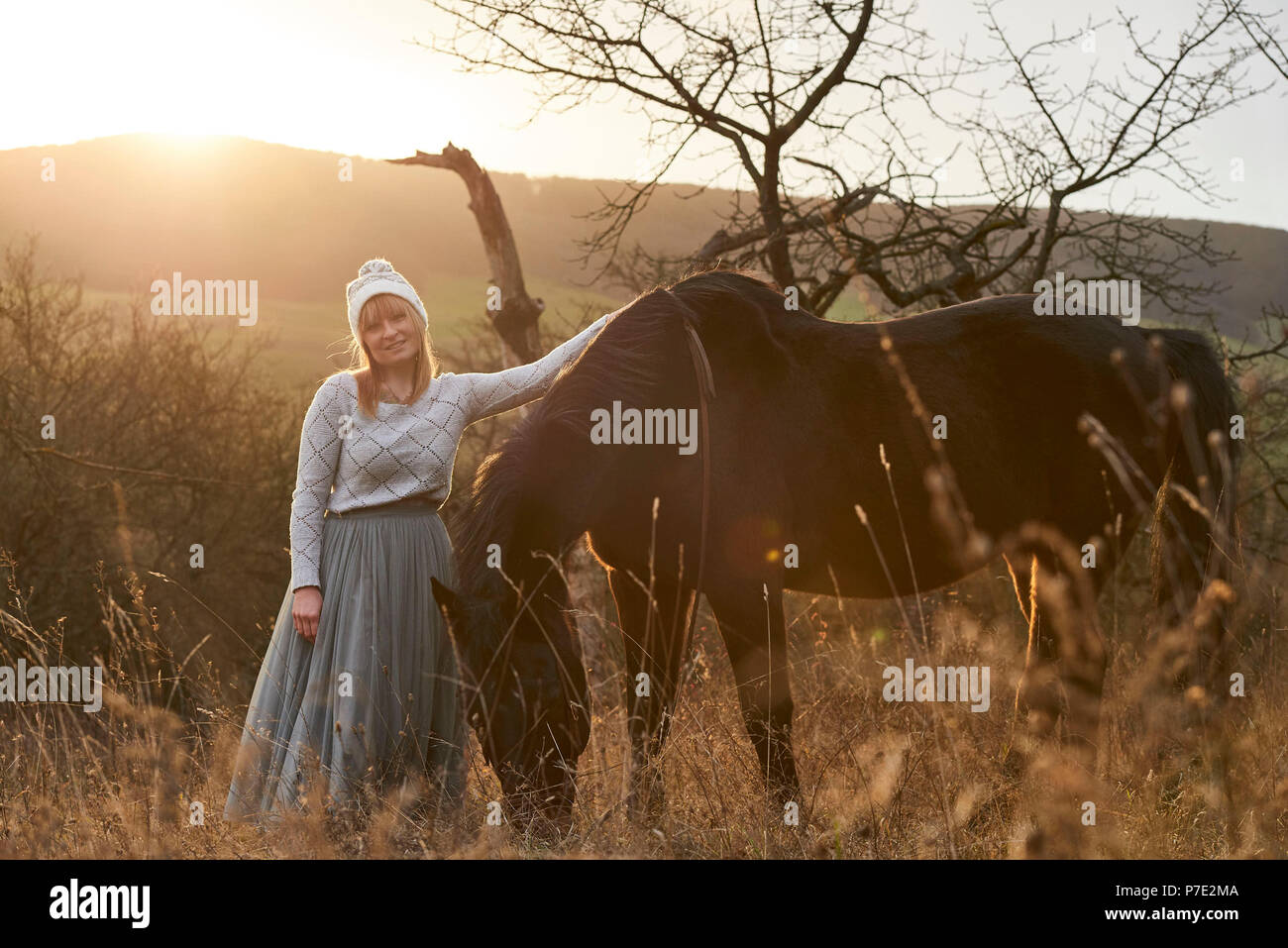 Portrait of woman with horse Stock Photo