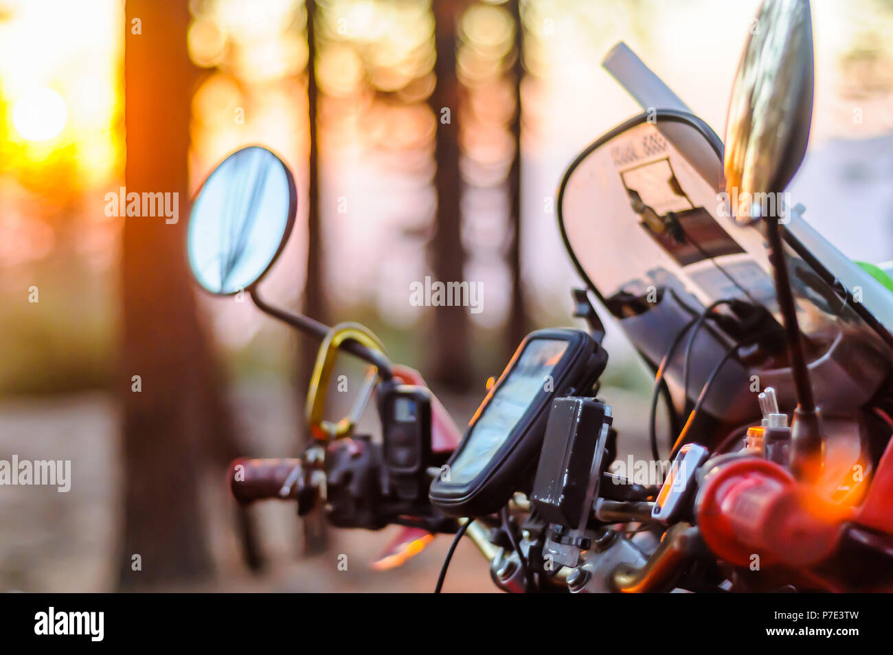 Windshield and controls of touring motorcycle at sunset, close up, Yosemite National Park, California, USA Stock Photo