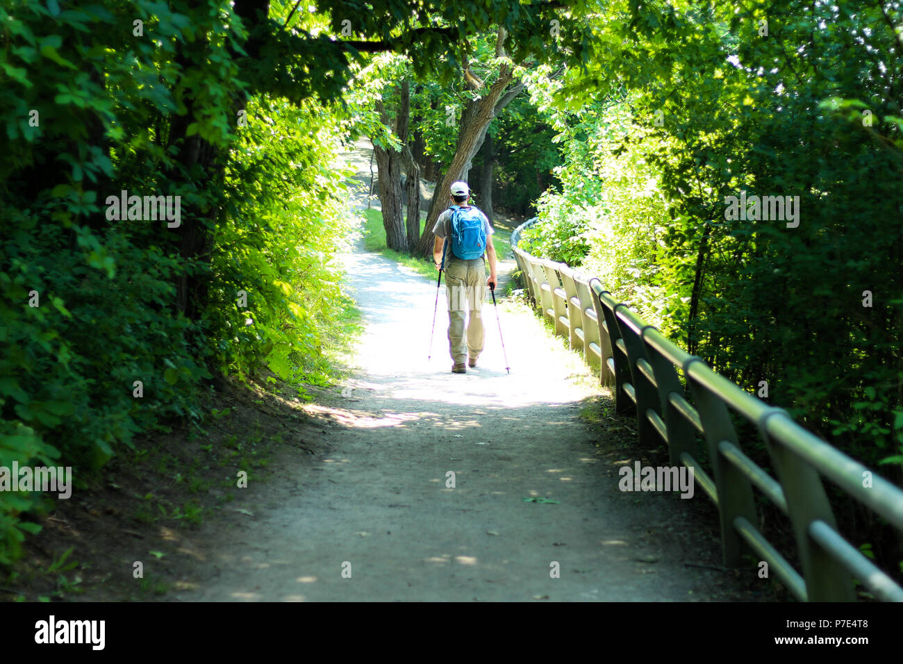 A man hiking the Niagara Gorge Trail at Whirlpool State Park Stock Photo