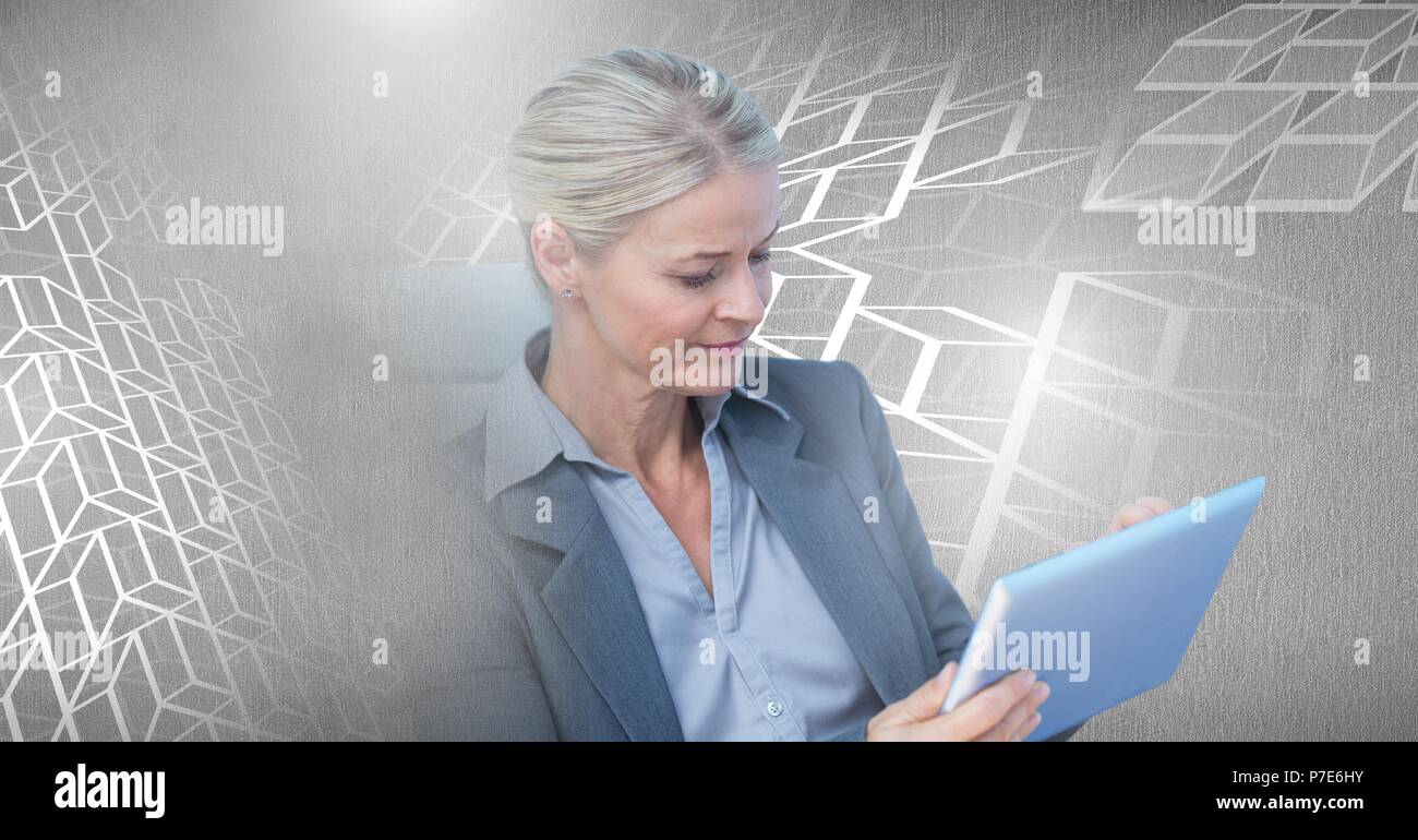 Woman using laptop with geometric transition Stock Photo