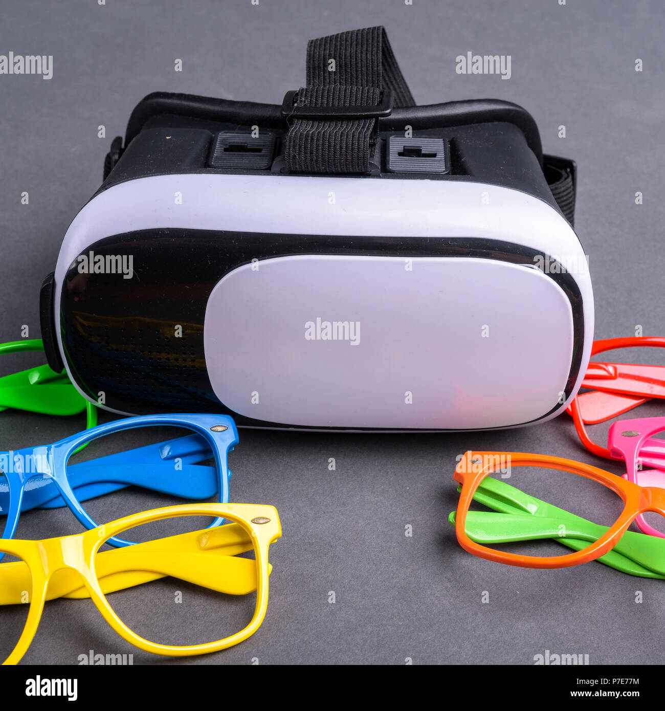 Colorful Eyeglasses And Virtual Reality Glasses Stock Photo