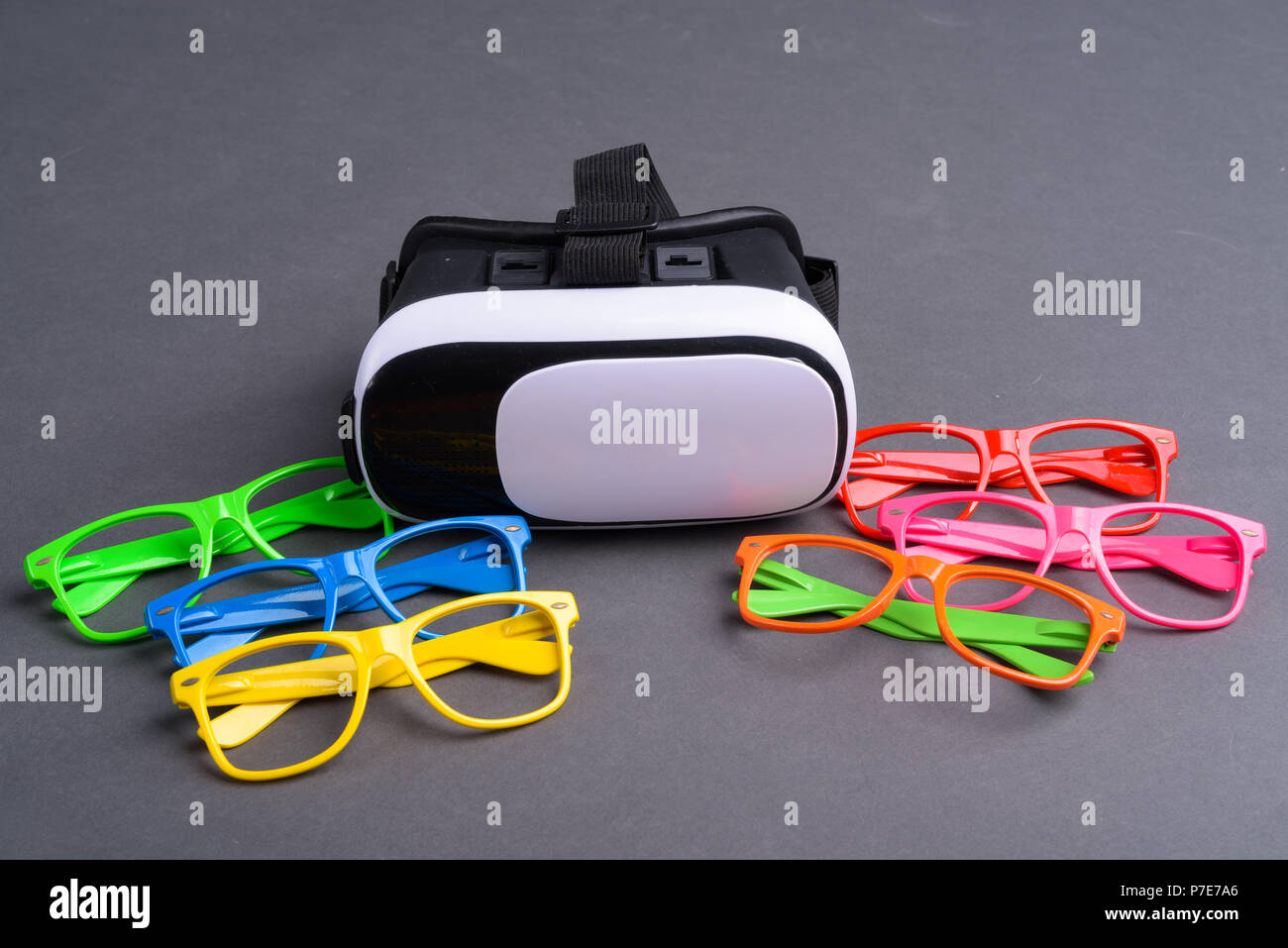 Colorful Eyeglasses And Virtual Reality Glasses Stock Photo