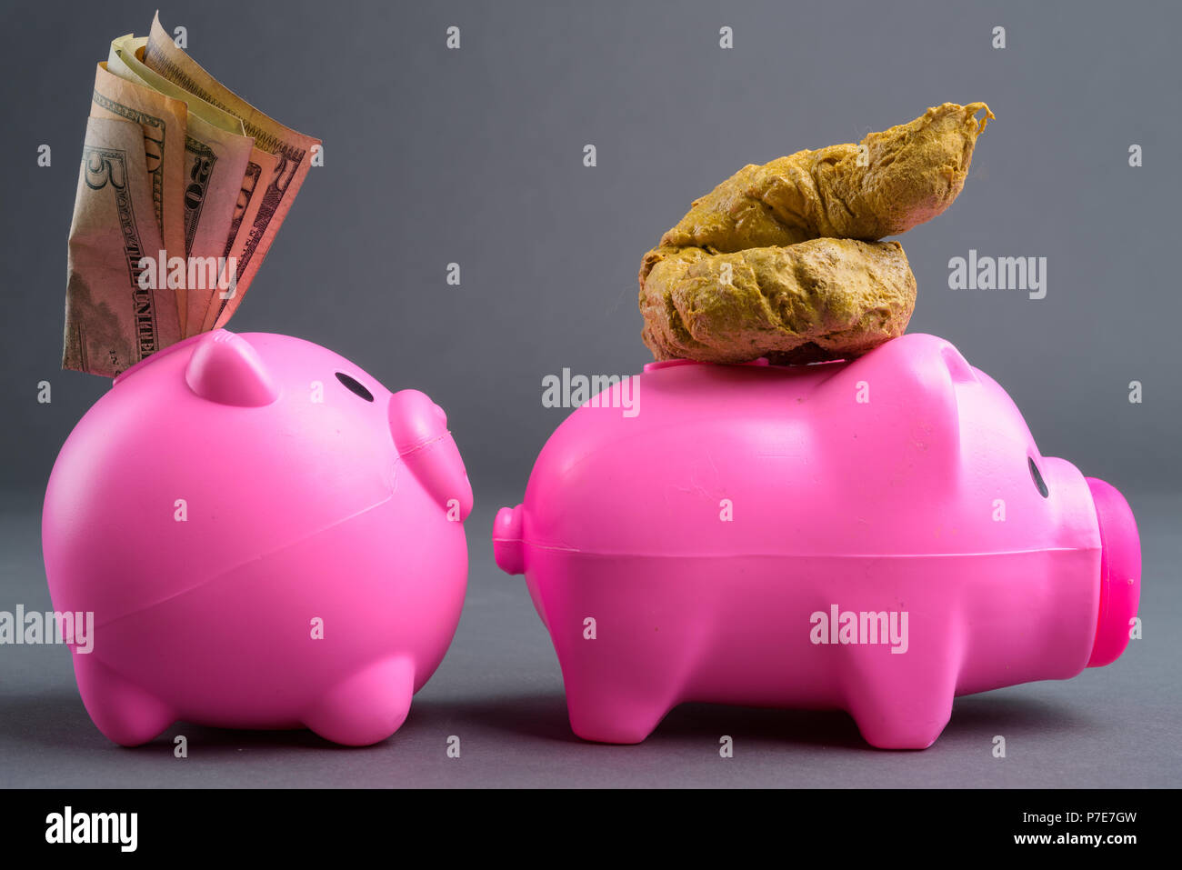 Two Piggy Banks In A Row Stock Photo - Alamy