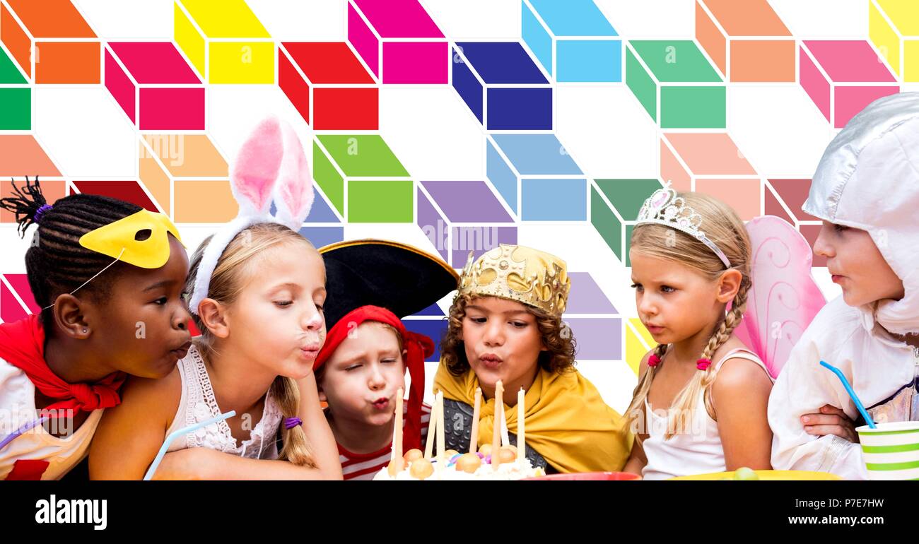 Birthday children in fancy dress costumes with colorful geometric pattern Stock Photo