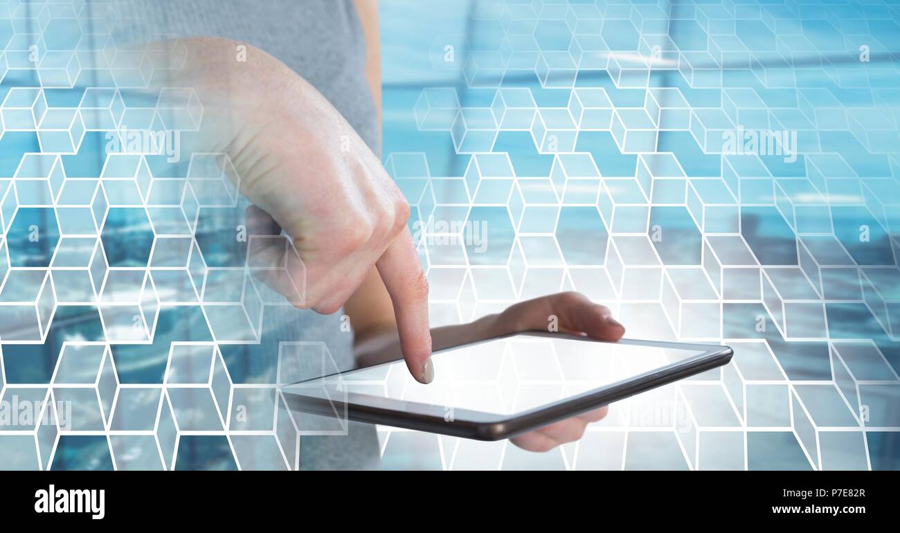 Woman using tablet with geometric transition Stock Photo