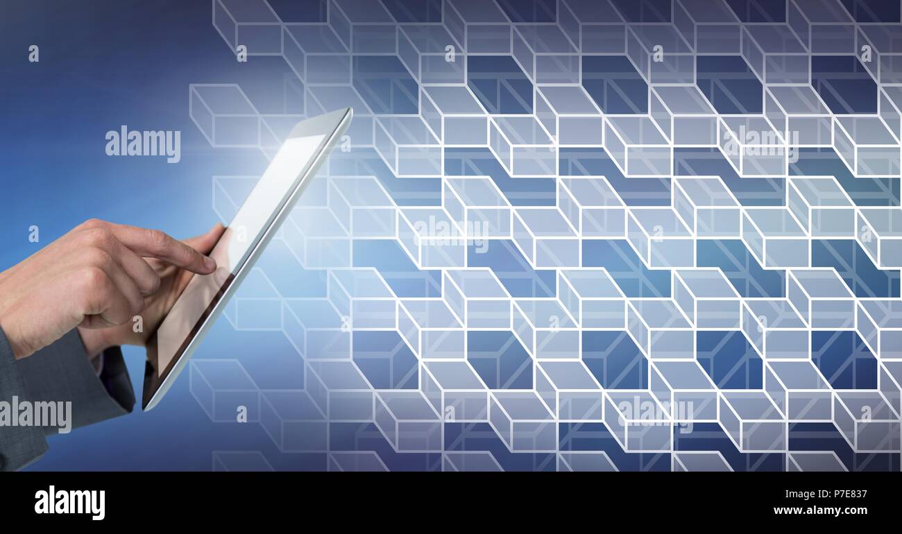 Hand using tablet with geometric transition Stock Photo