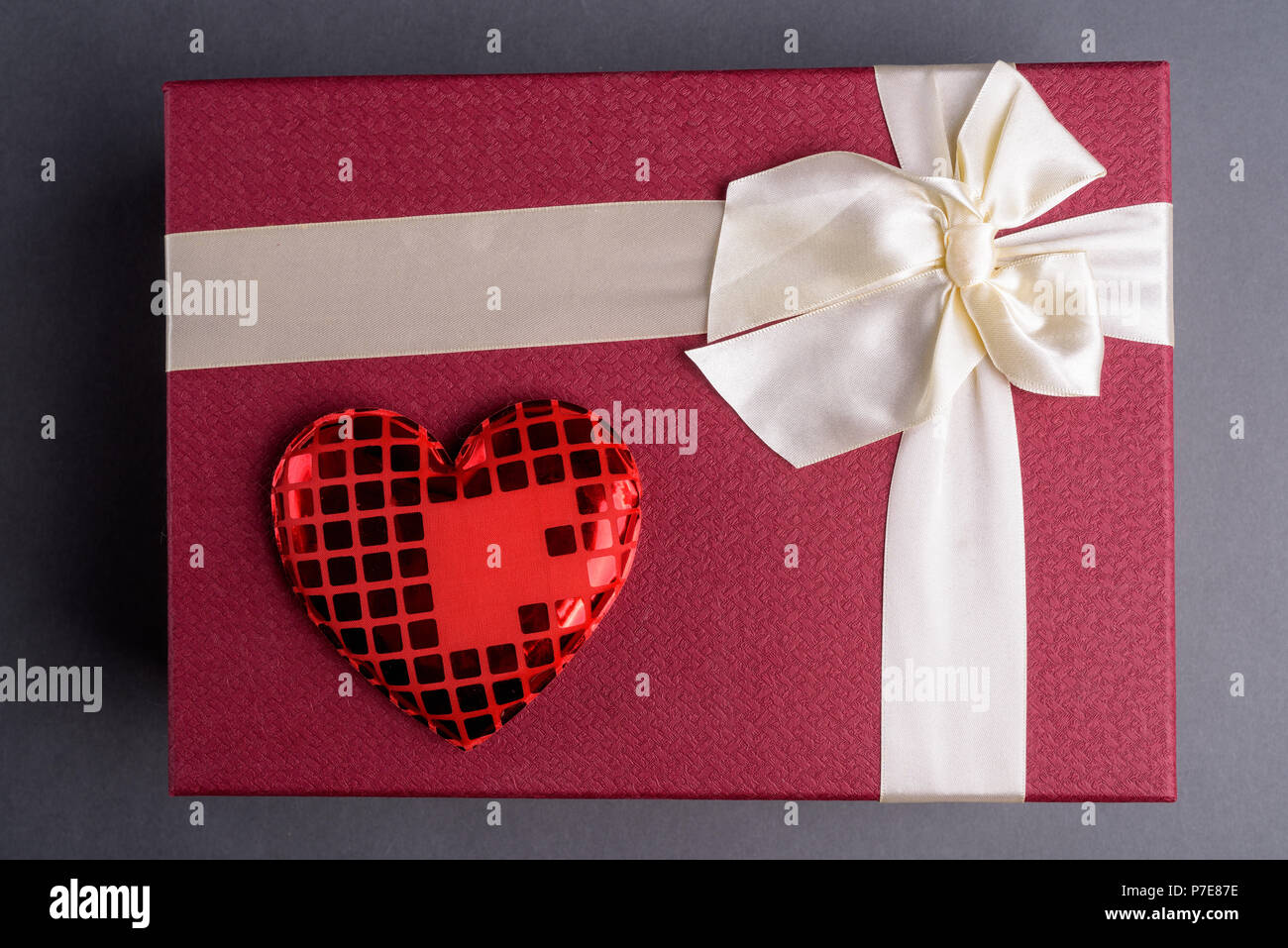 Studio Shot Of Gift Box Against Gray Background Stock Photo