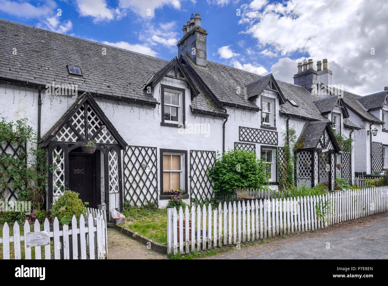 Row of white houses in the village Kenmore, Perth and Kinross, Perthshire in the Highlands of Scotland, UK Stock Photo