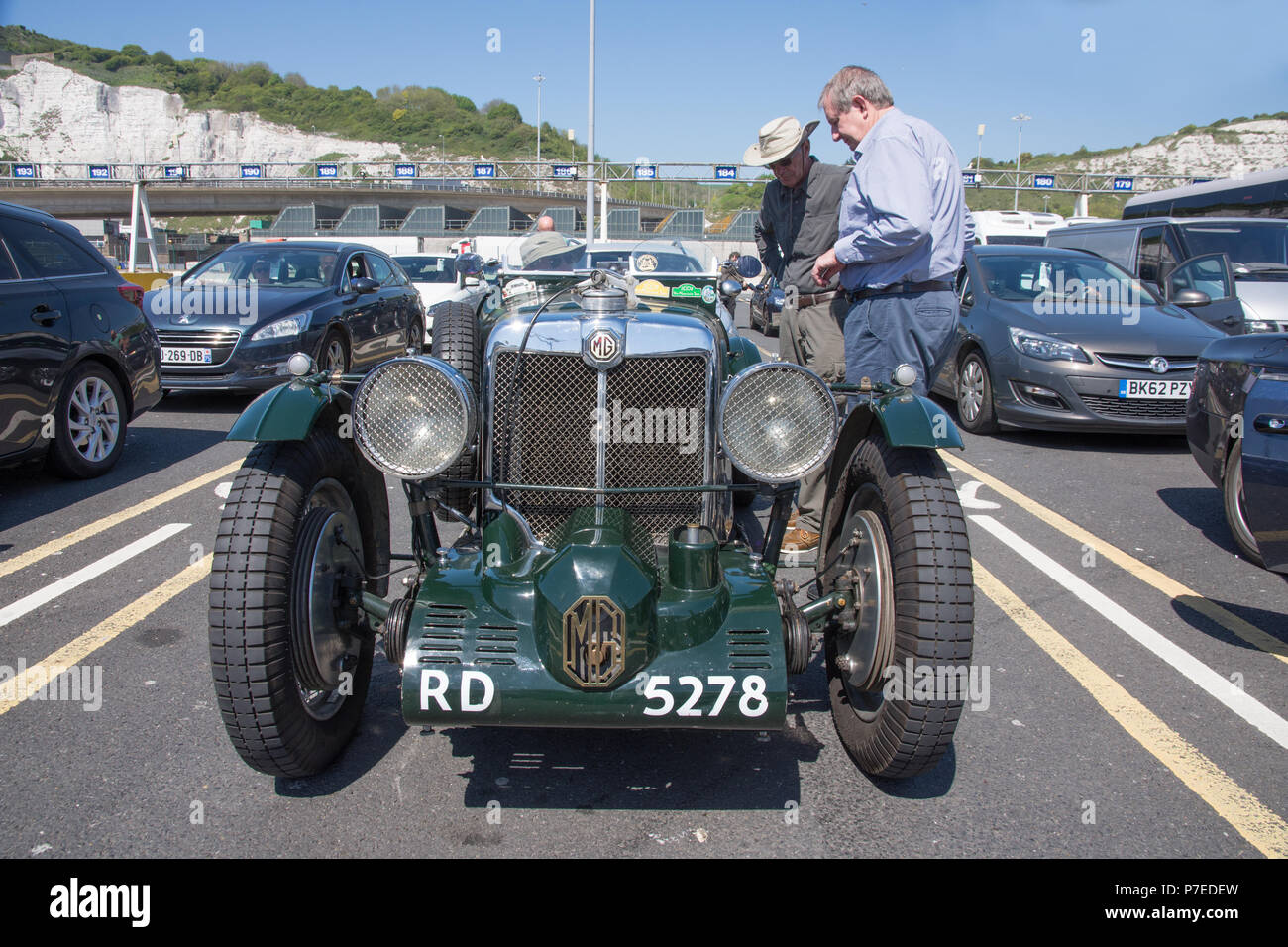 Green 1934 MG sportscar. This is a 2 rigid axle 1086cc petrol driven vintage car waiting to board a car ferry from Dover to Calais Stock Photo