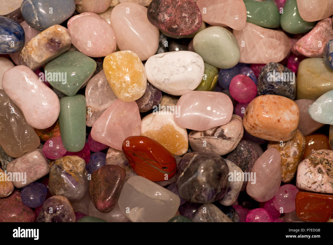 Colorful polished  semi precious gemstones detail background texture Stock Photo