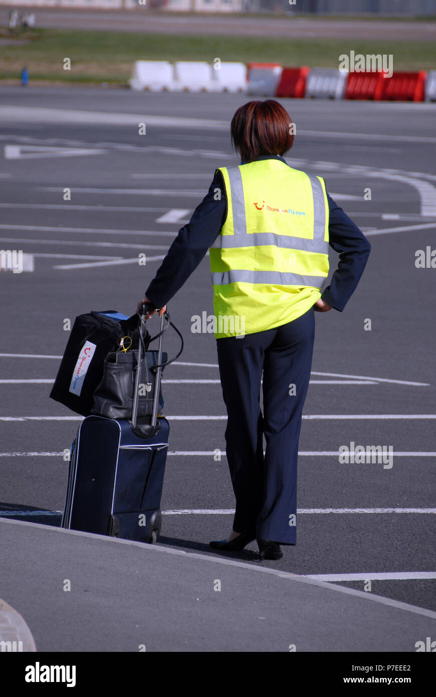 Airline staff waiting on tarmac to board plane at Doncaster Sheffield Airport, formerly named Robin Hood Airport Doncaster Sheffield, Stock Photo