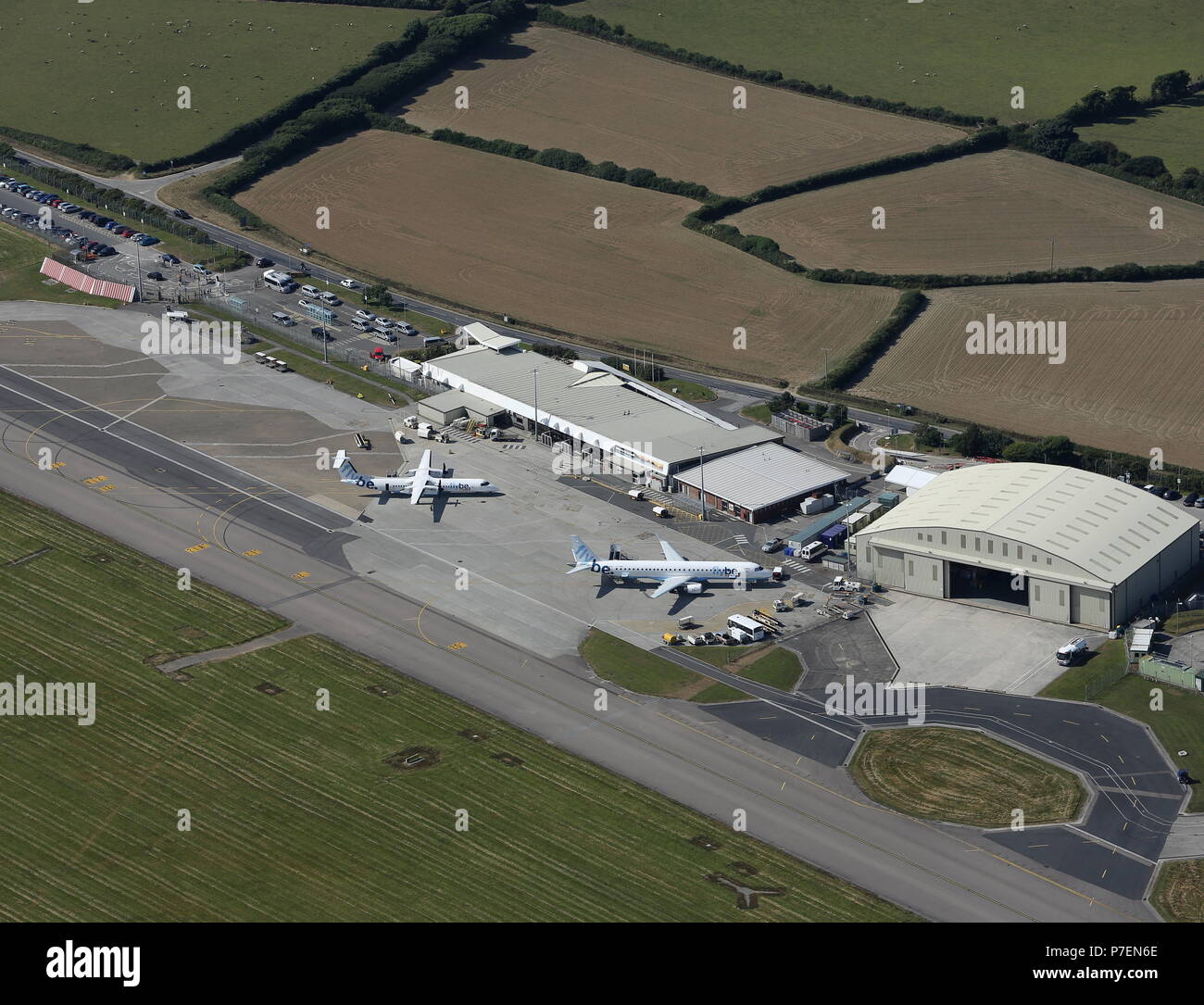 Aerial view of the Newquay (Cornwall) airport terminal with two Flybe aircraft on the ramp Stock Photo