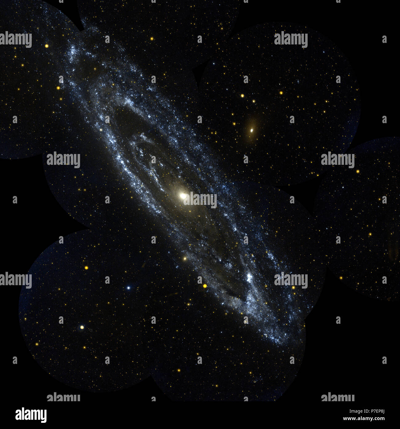 Andromeda Galaxy.  This image is from NASA's Galaxy Evolution Explorer is an observation of the large galaxy in Andromeda, Messier 31. The Andromeda galaxy is the most massive in the local group of galaxies that includes our Milky Way. Stock Photo