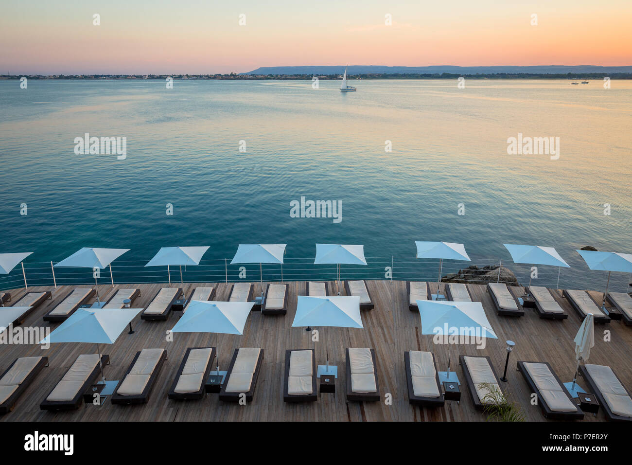 Syracuse, Isle of Sicily, Italy. Sunset in front of the sea at the end ...