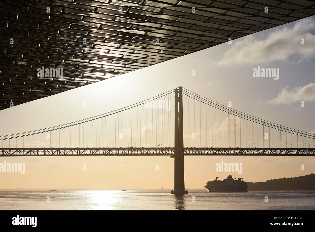 View towards Ponte de 25 Abril at dawn. MAAT, Lisbon, Portugal. Architect: A LA, 2016. Stock Photo