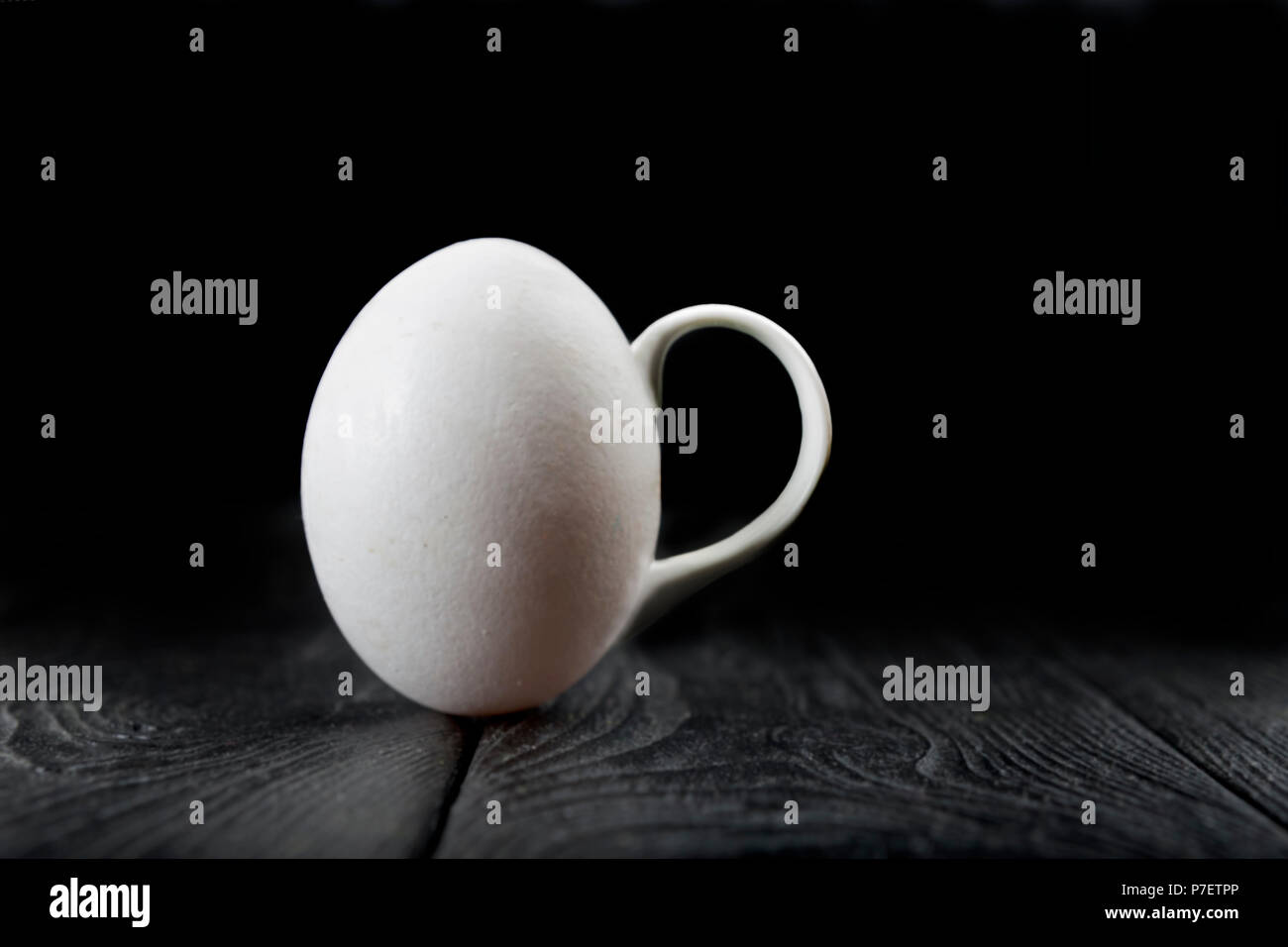 Abstract egg on a black background. Copy space. Stock Photo