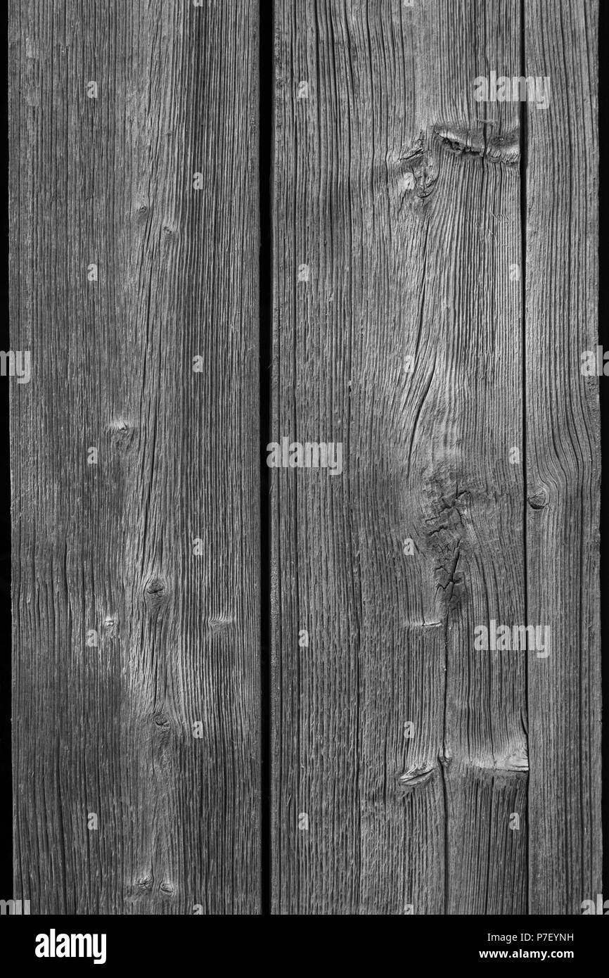 Close-up of an old and unpainted rustic wood board texture background in black and white Stock Photo