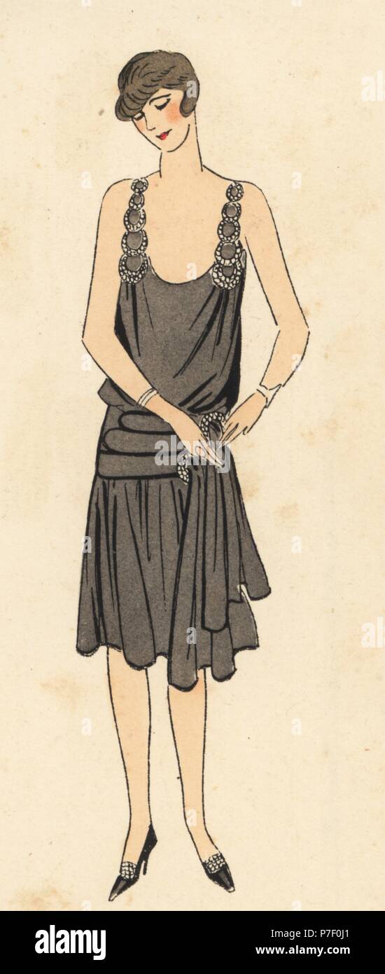 Woman in afternoon dress of black muslin with diamantes. Handcolored pochoir (stencil) lithograph from the French luxury fashion magazine Art, Gout, Beaute, 1927. Stock Photo