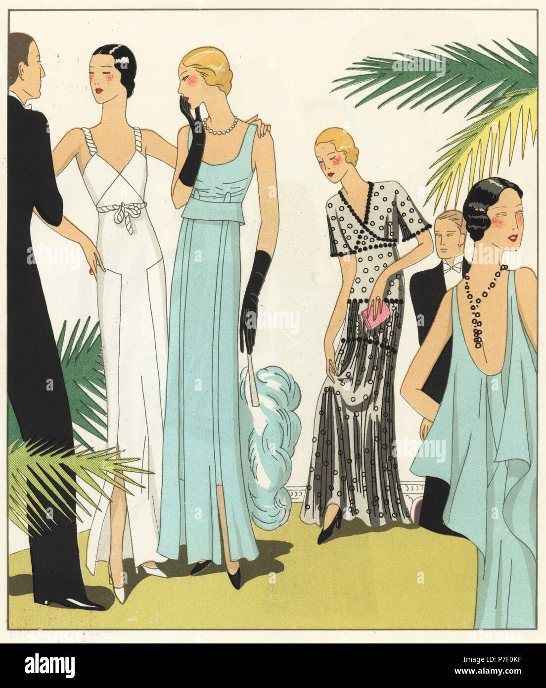 Woman in white satin crepe evening gown, woman in blue crepe georgette evening dress, and woman in tulle dress with velvet pastilles. Men in tuxedos. Handcolored pochoir (stencil) lithograph from the French luxury fashion magazine Art, Gout, Beaute, 1931. Stock Photo