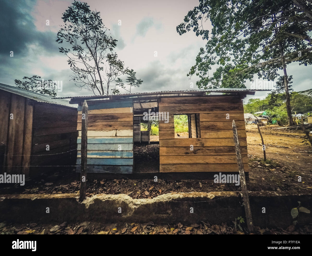 wooden hut , simple wood house in jungle landscape Stock Photo