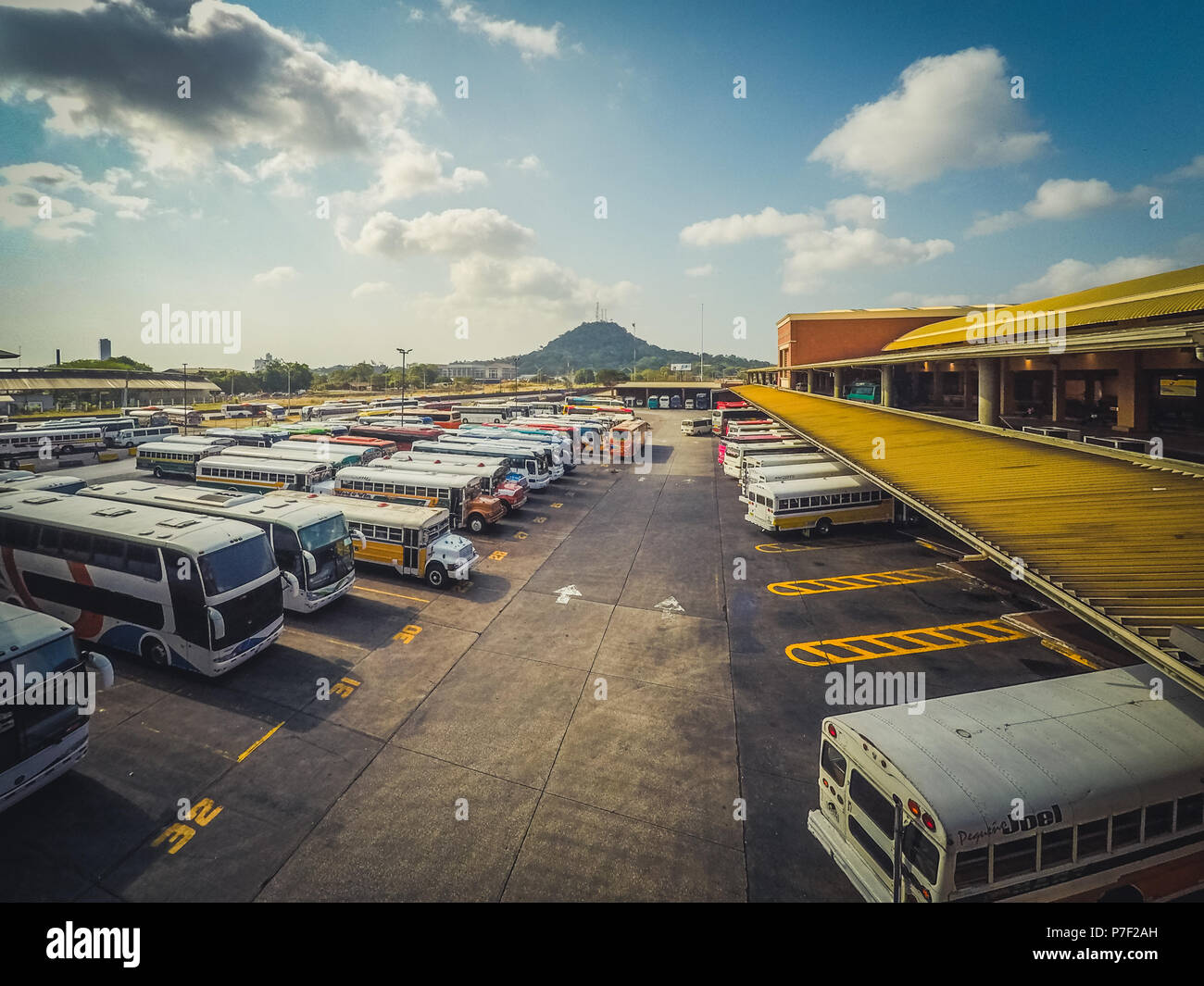Panama City - march 2018: Many colorful old buses on bus and train station Albrook in Panama City Stock Photo