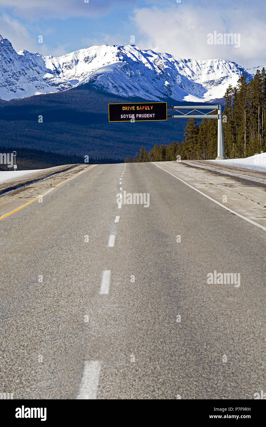 Winter conditions warning sign on Trans Canada Highway 1, Banff