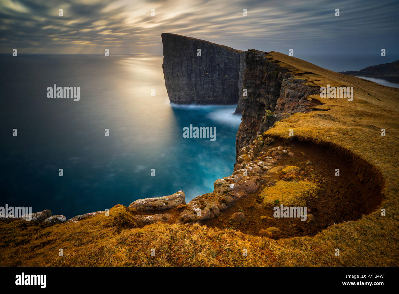 Cliffs of Traelanipa on Vagar island in sunset, Faroe Islands Stock ...