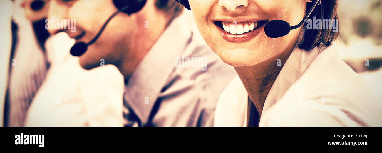 Female customer service agent in a call center Stock Photo