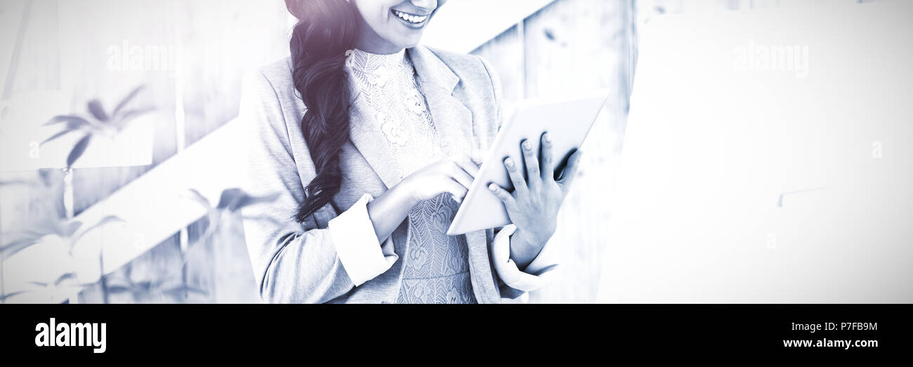 Stylish brunette working from home Stock Photo