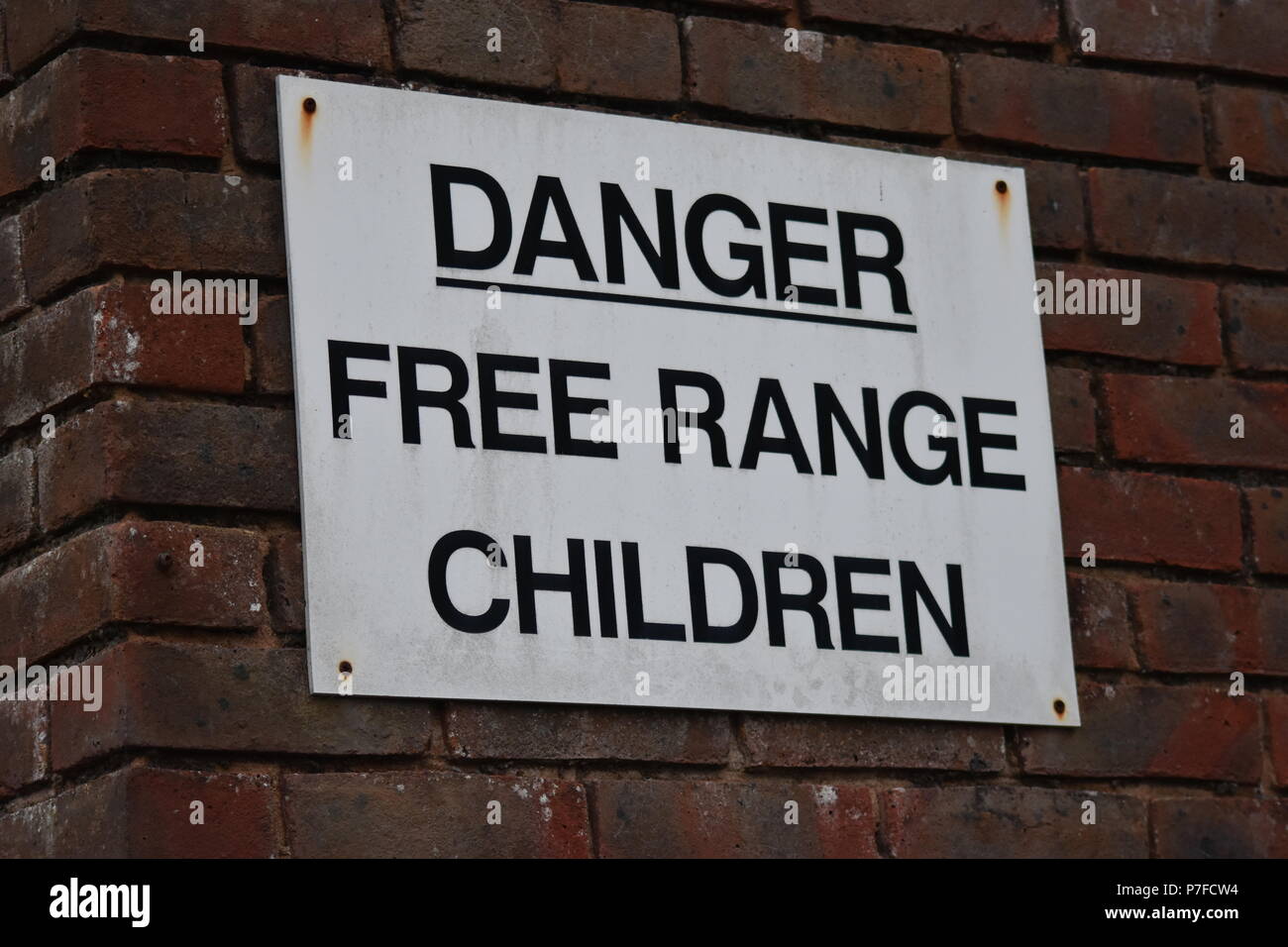 Free Range Children Playing Sign Stock Photo