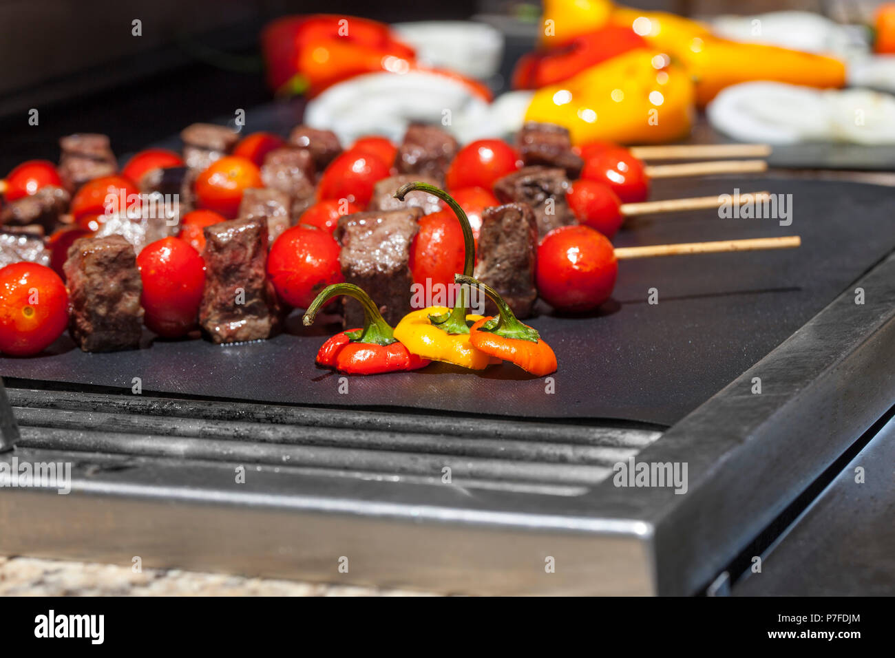 Grilling Kebabs on Grill Mats Outside Summer Stock Photo Alamy
