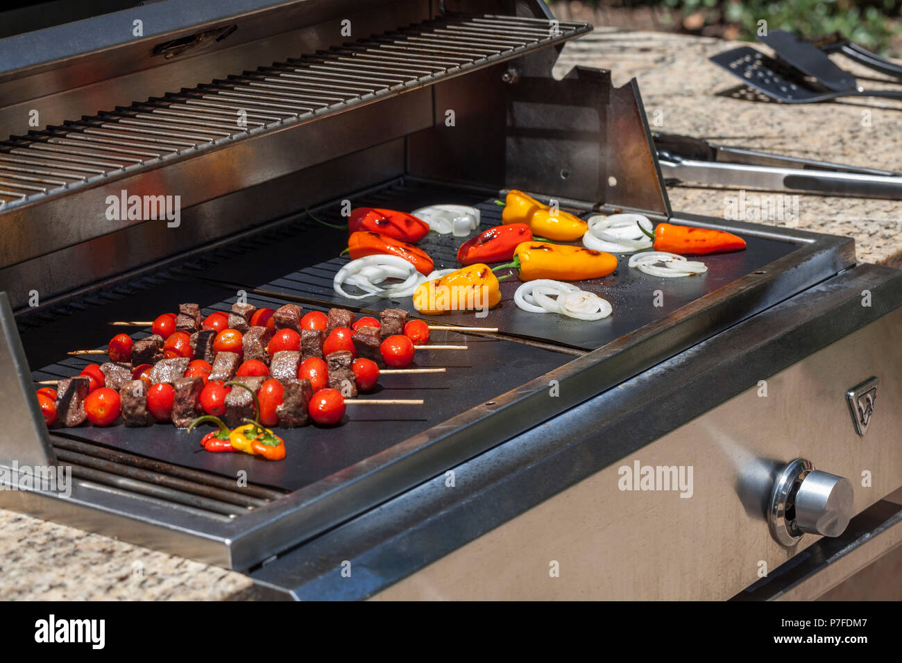 Grilling Kebabs on Grill Mats Outside Summer Stock Photo - Alamy