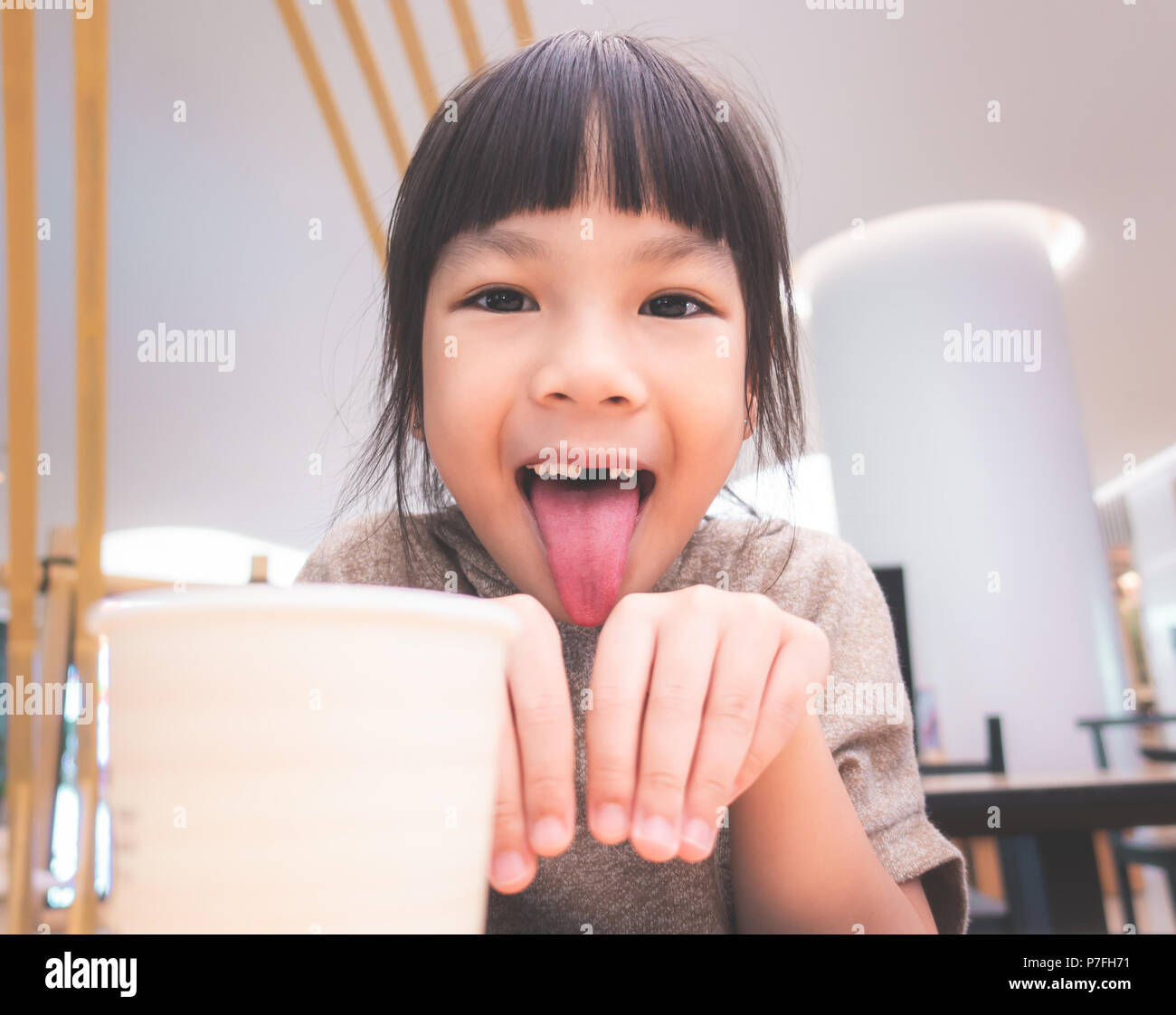 little Girl act like dog asking for water Stock Photo Alamy