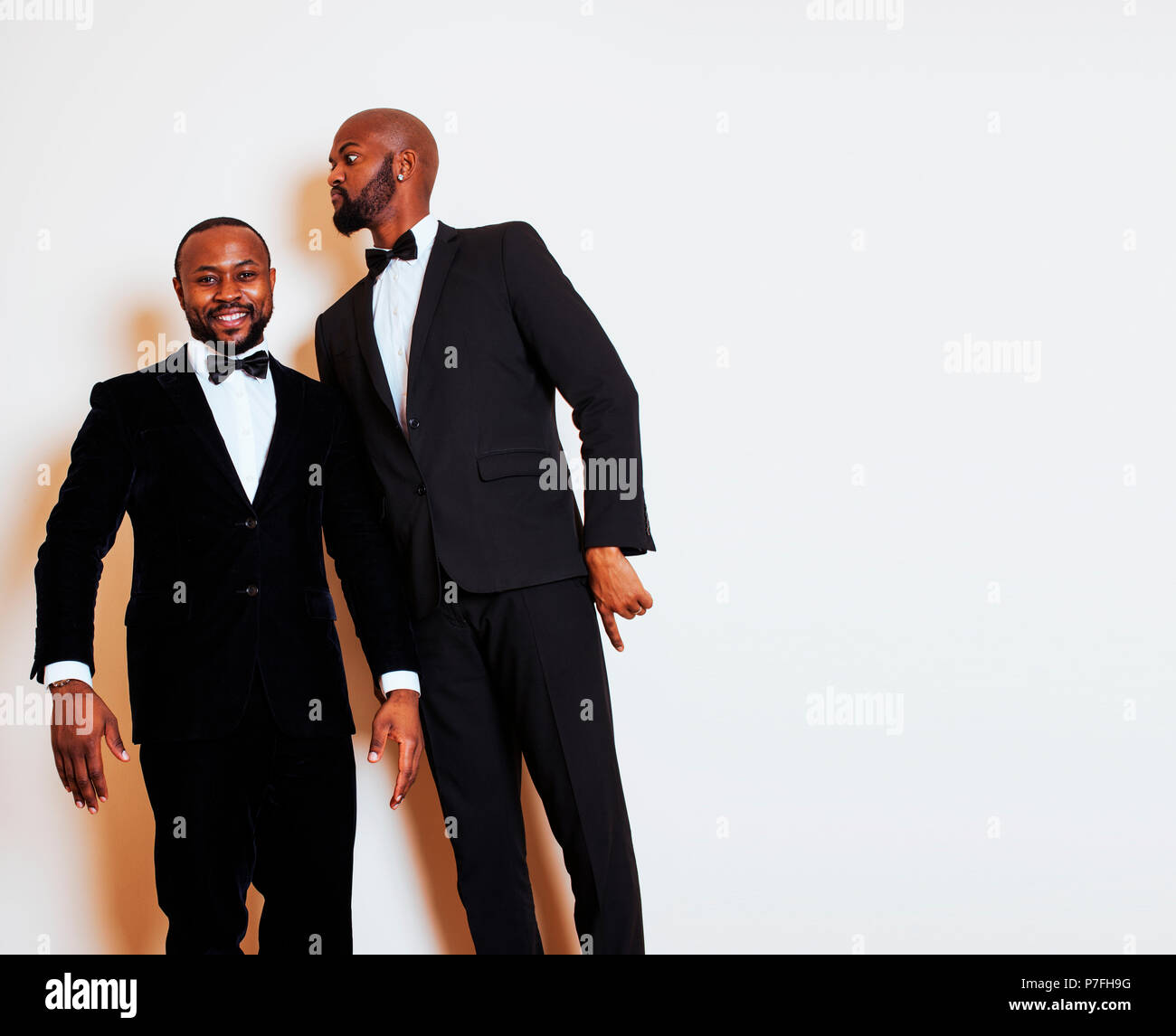two afro-american businessmen in black suits emotional posing, g Stock ...