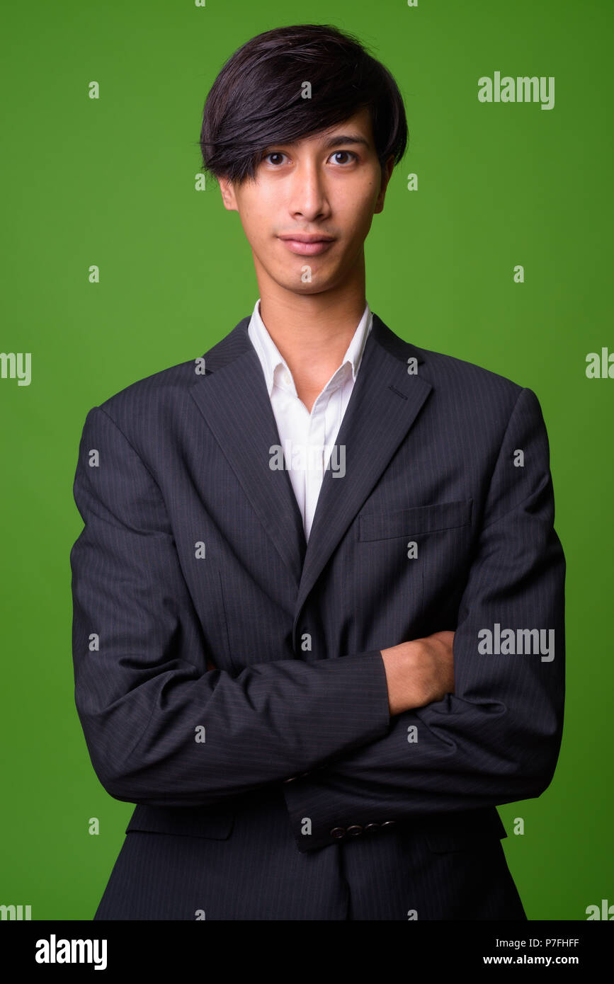 Young Asian businessman wearing suit Stock Photo - Alamy