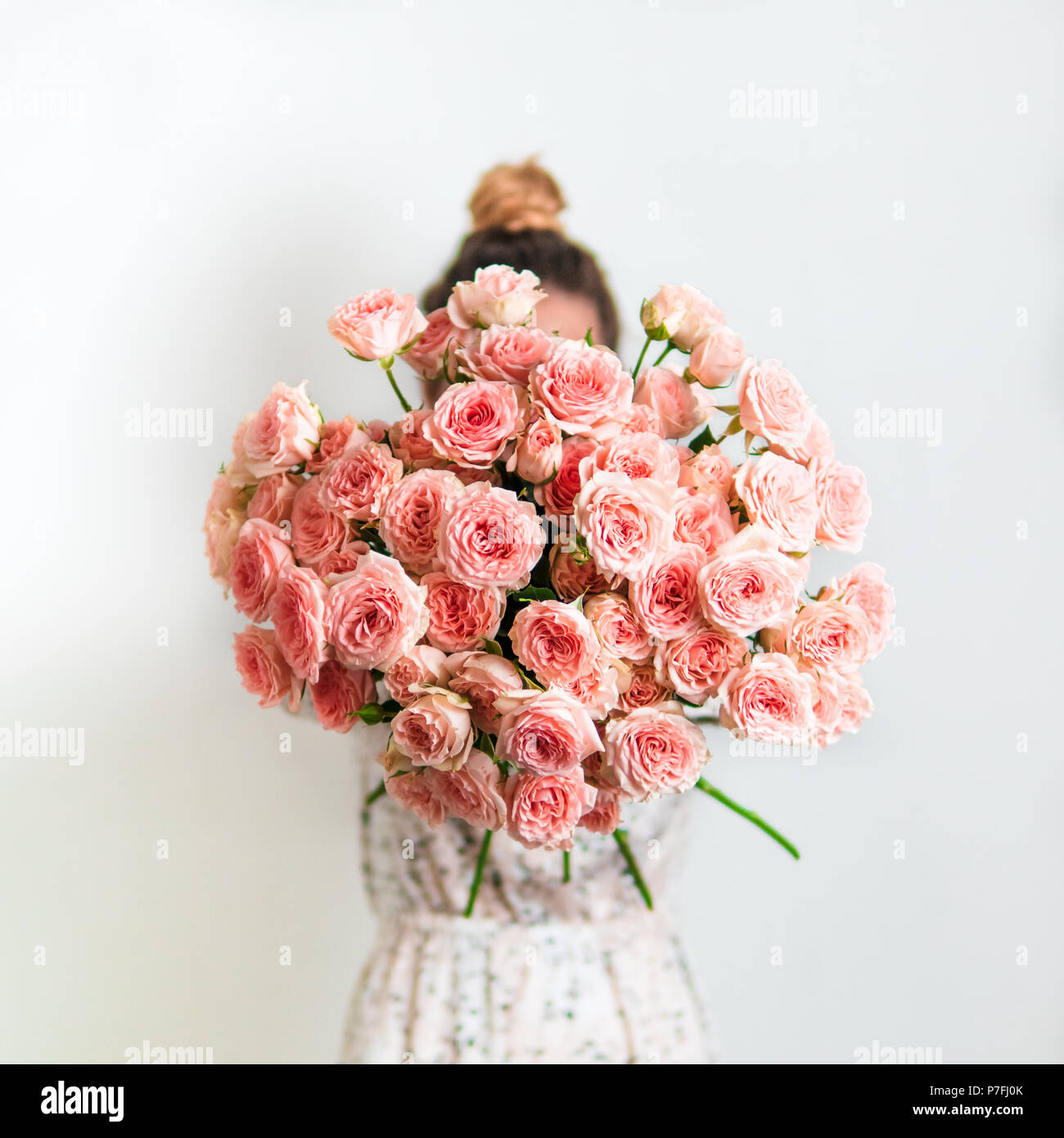 Subtle Delicate Close up view of nice subtle delicate pink bouquet with roses, dianthus ...