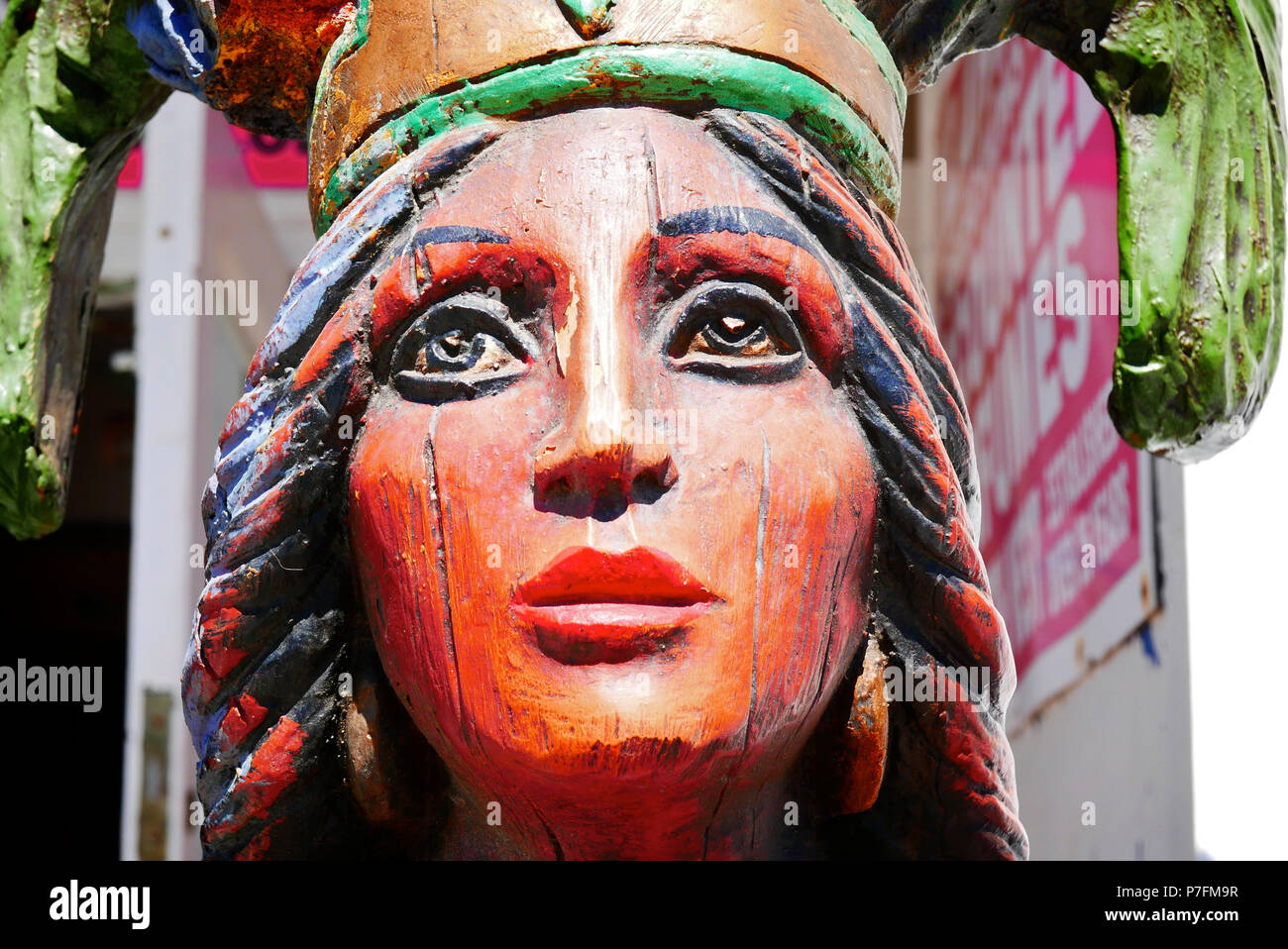 Wood carving of north american indian Princess Stock Photo