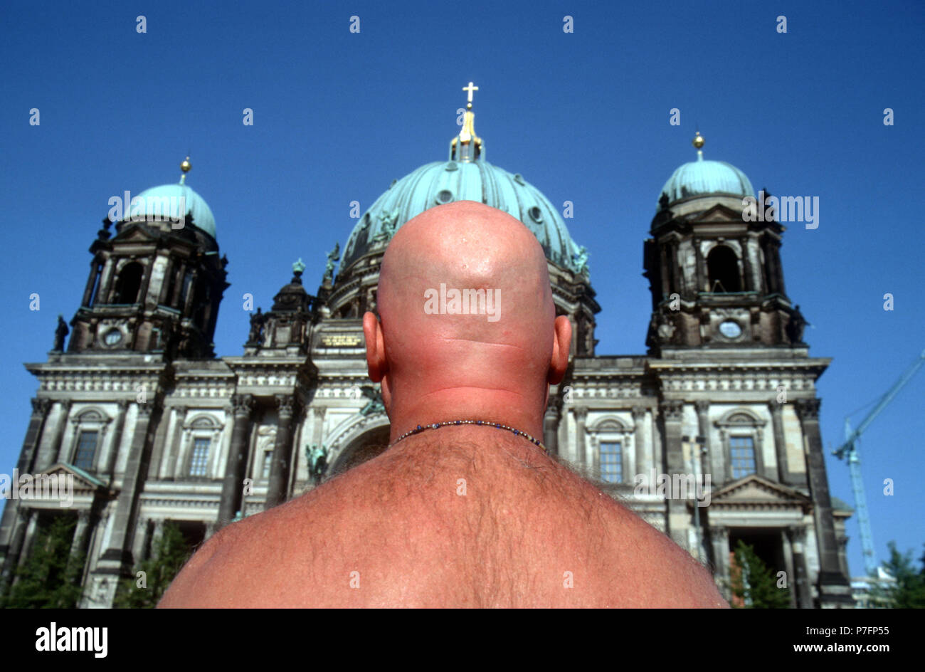 D, Berlin: Man with bald head in front of Berlin Cathedral, Berlin, Germany Stock Photo