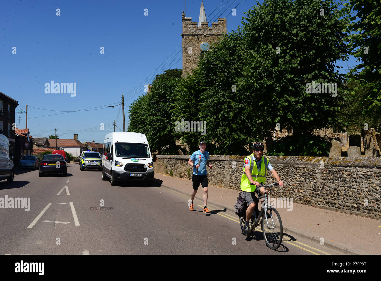 Participants of the Royal Air Force 100 Baton relay transition through