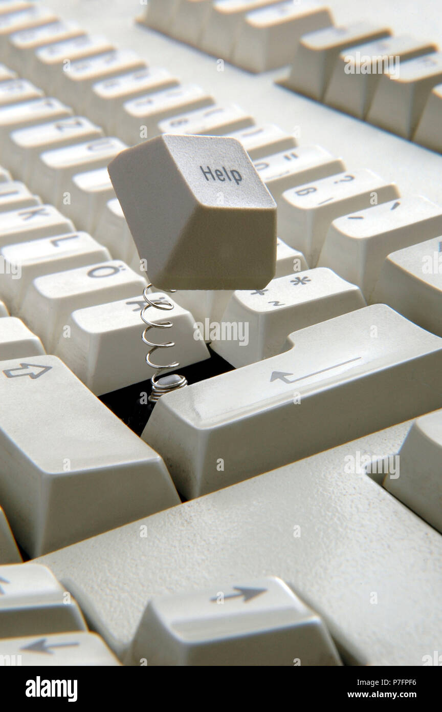 Help key jumps out of the keyboard Stock Photo Alamy